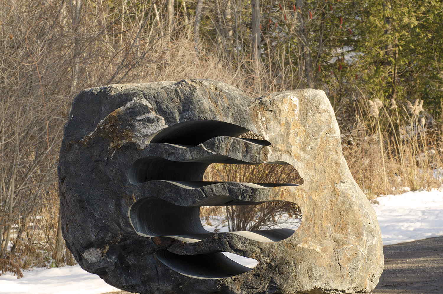 Custom stone sculpture LED landscape lighting