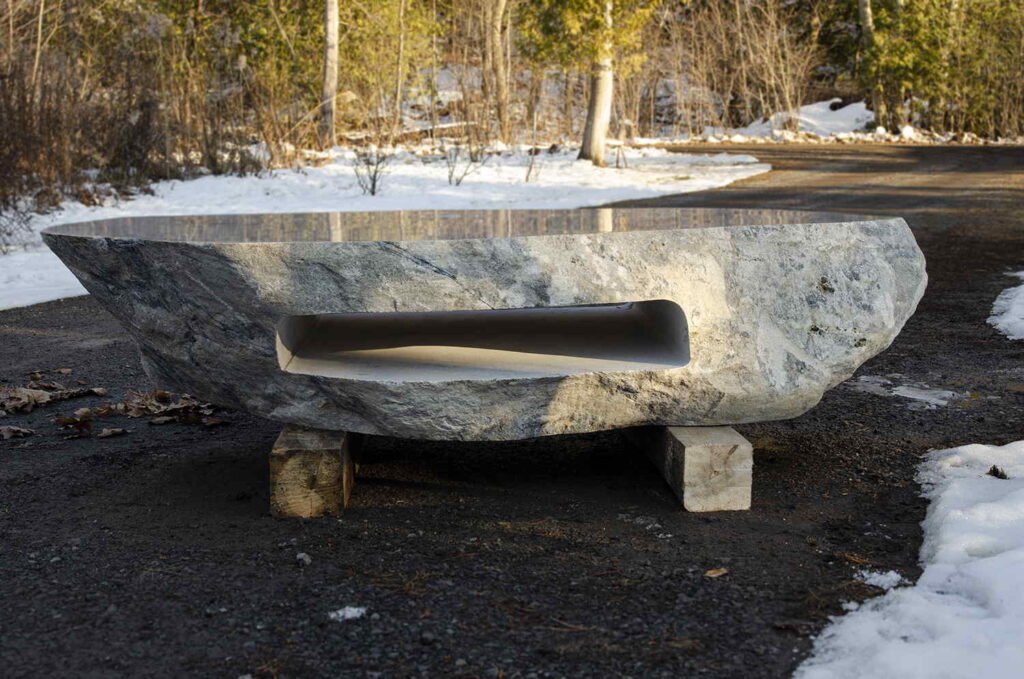 Polished stone boulder coffee table
