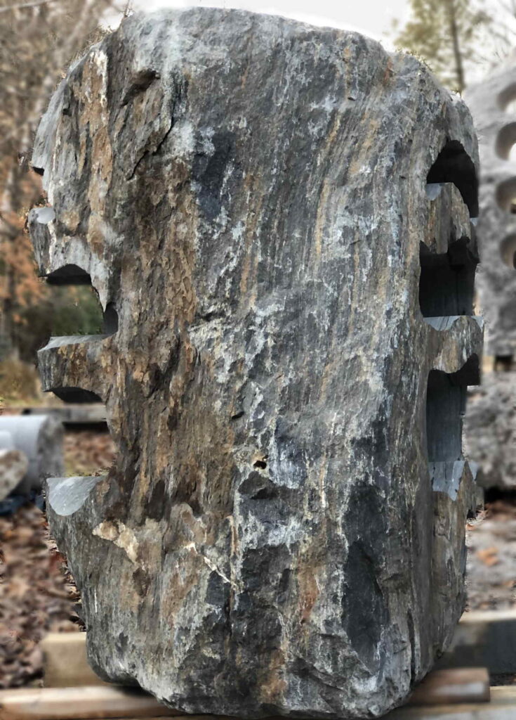 Custom stone sculpture LED landscape lighting